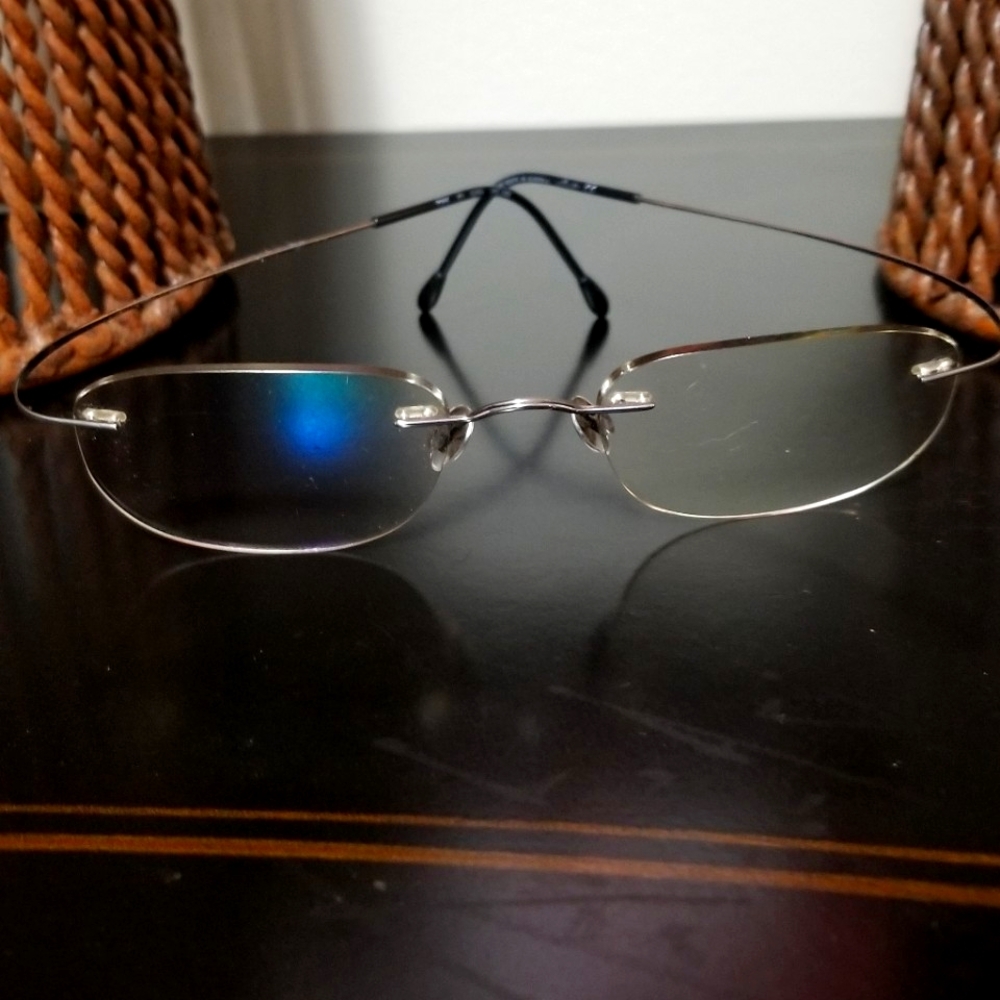 Silhouette Titan Rimless Eye Glasses With Case.